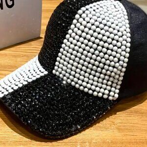 Black and white Unisex split dedazzled cap.